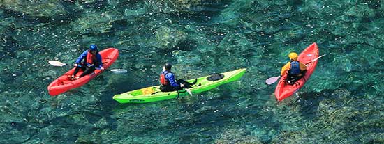 Kayaking the clear water at Scorpion Anchorage